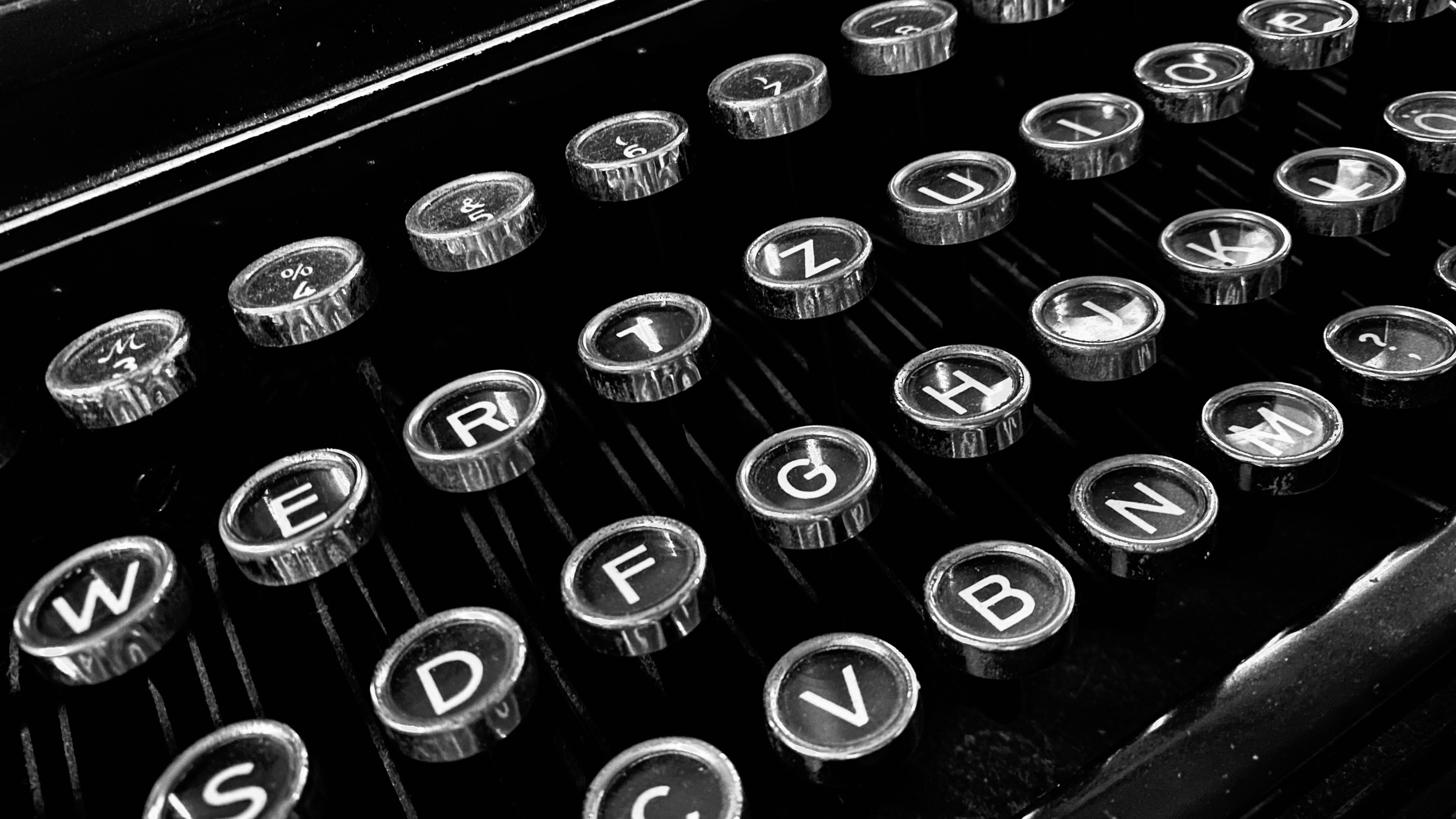 black and white typewriter button