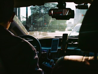 person driving car during daytime
