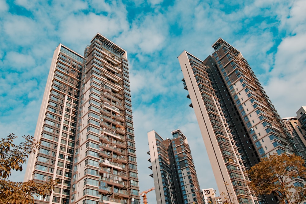 white and brown high rise building under blue sky