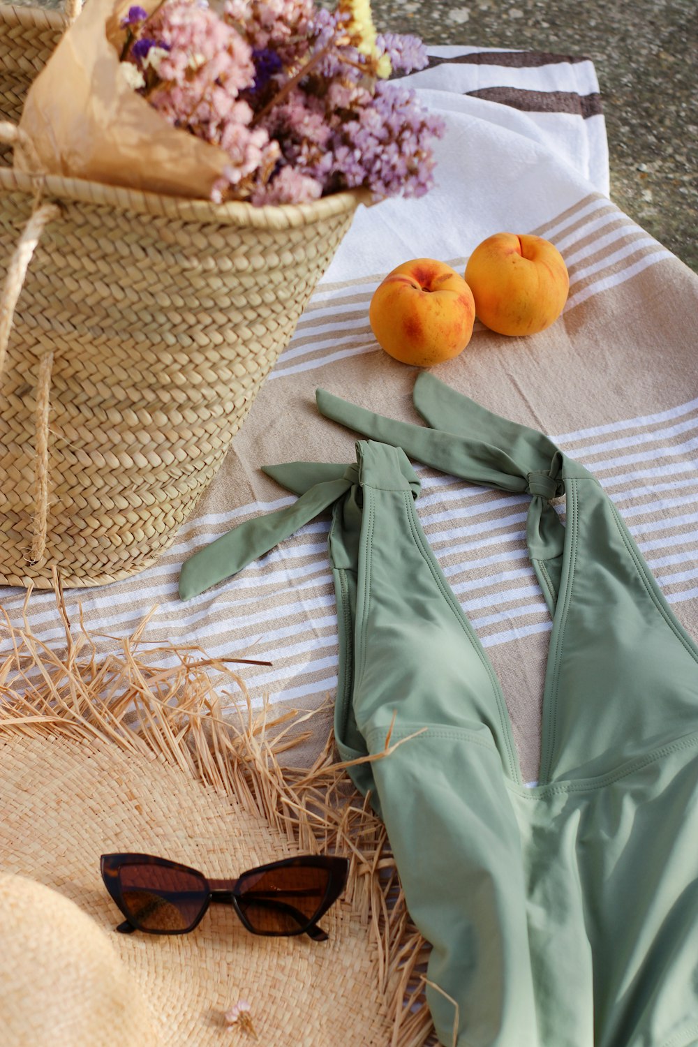 orange fruit on brown woven basket