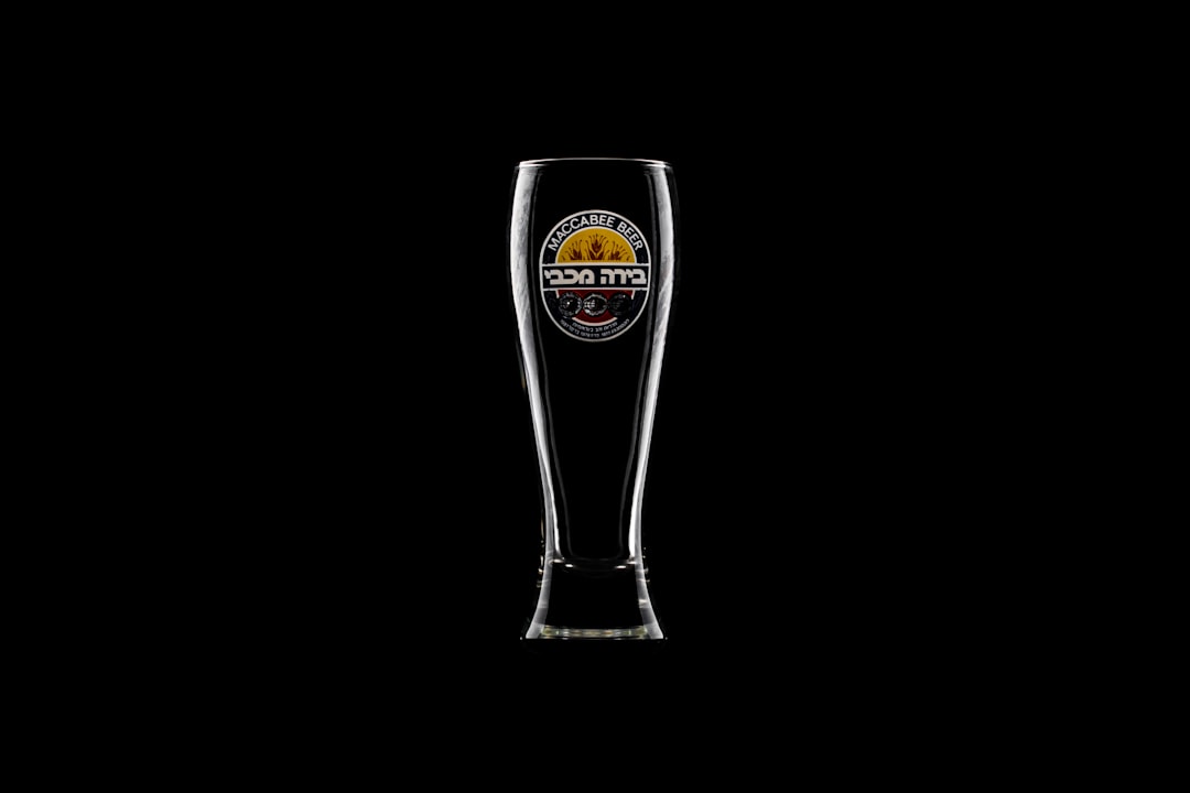 clear drinking glass with black background