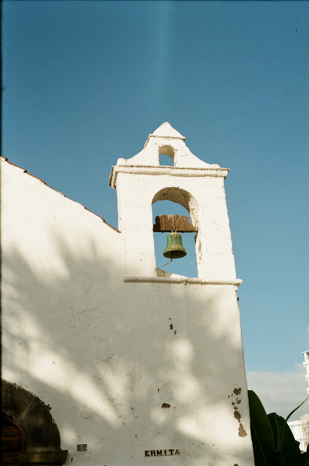 white concrete building under blue sky during daytime