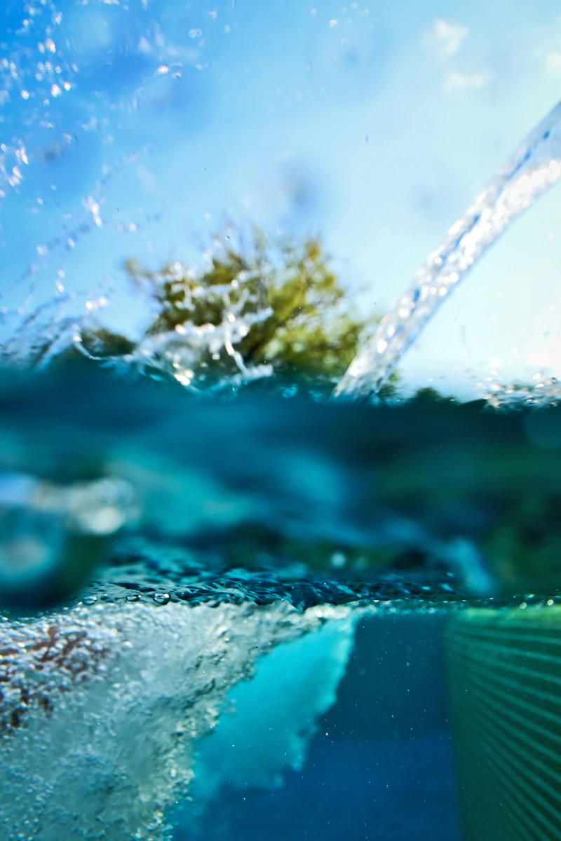 Close-up of clear turquoise pool water with fresh circulation