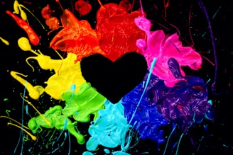 black heart on blue and red abstract painting