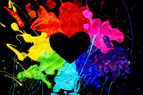 black heart on blue and red abstract painting