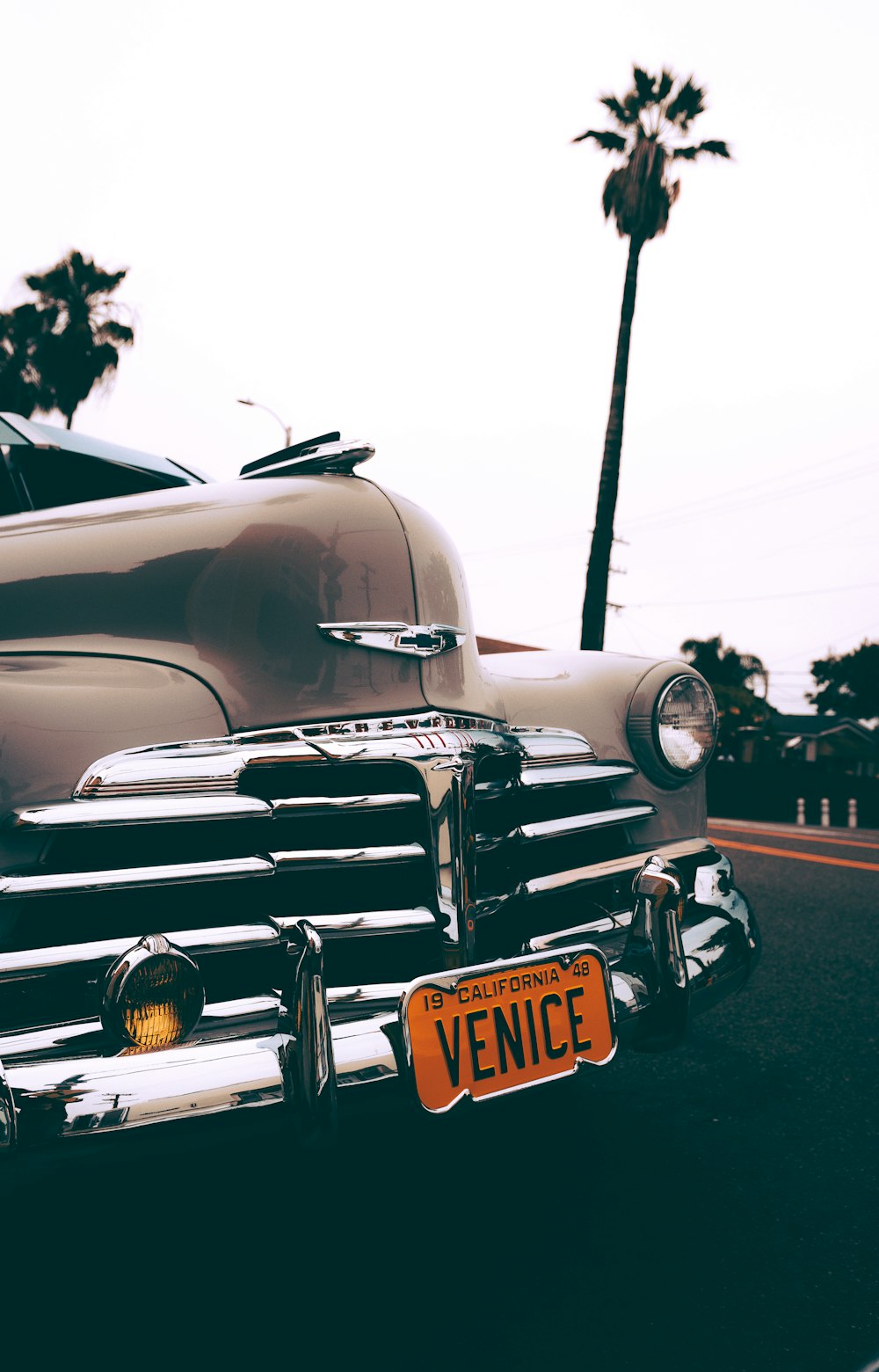 grayscale photo of car on road