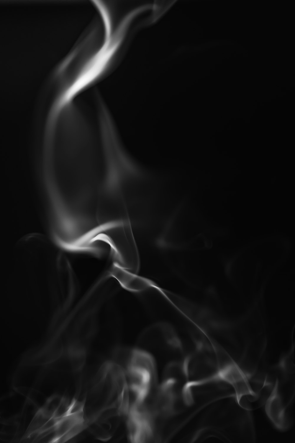 white smoke in black background