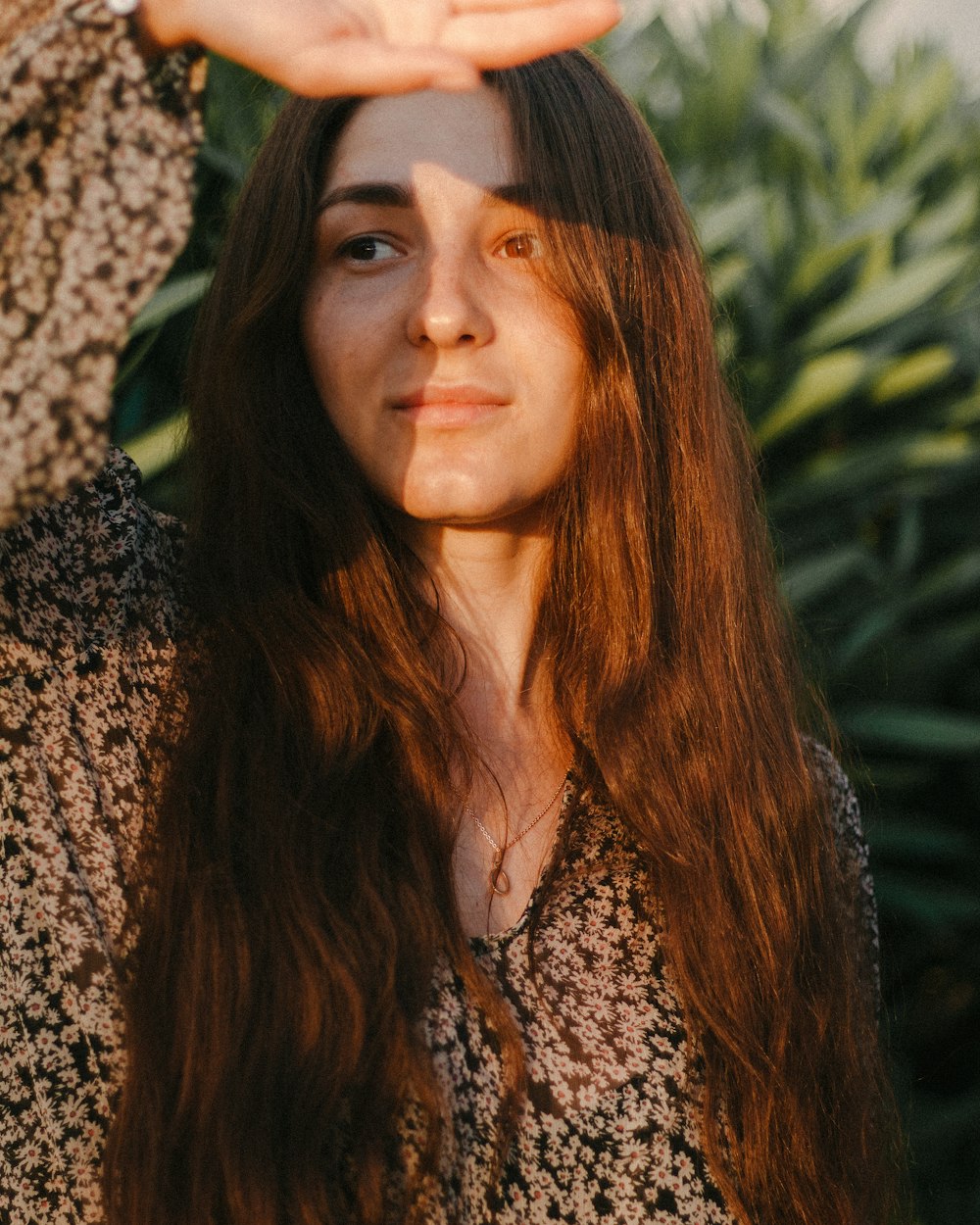 woman in black and white floral shirt