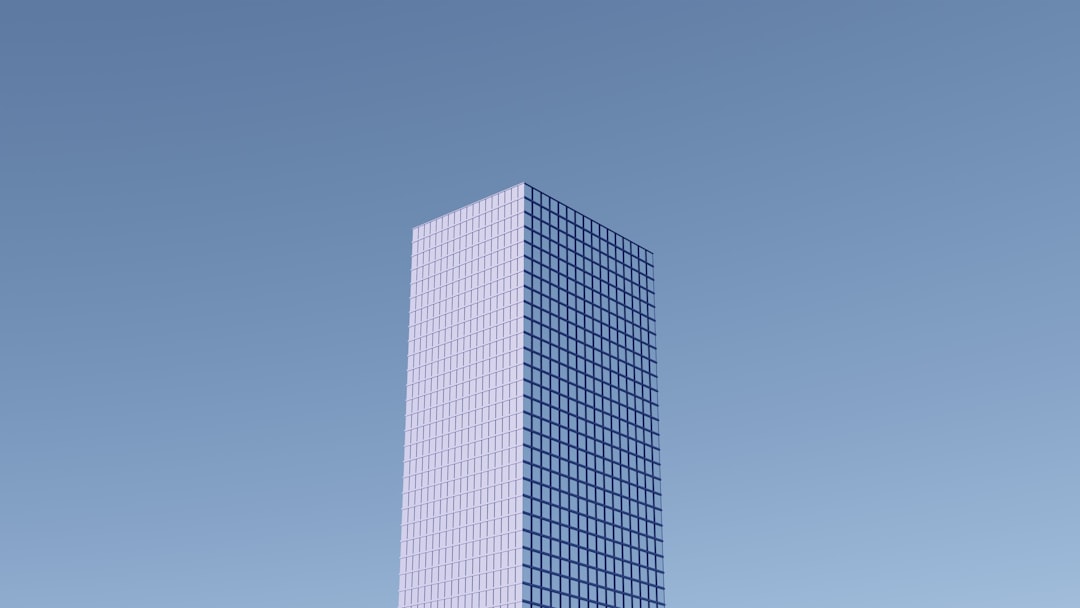 white concrete building under blue sky during daytime