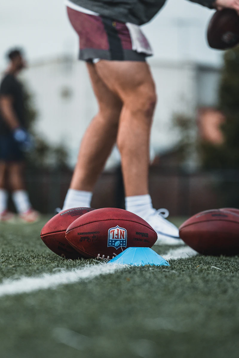 Footballs on the grass