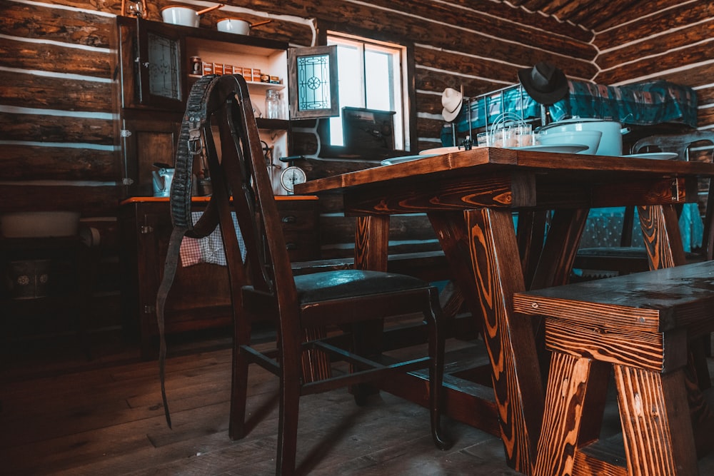 brown wooden table with chairs