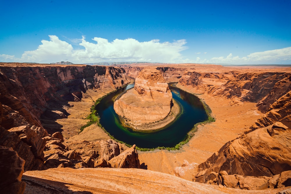 brown rock formation under blue sky during daytime