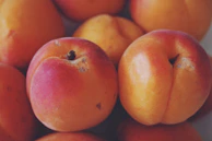 red apple fruit on brown wooden table