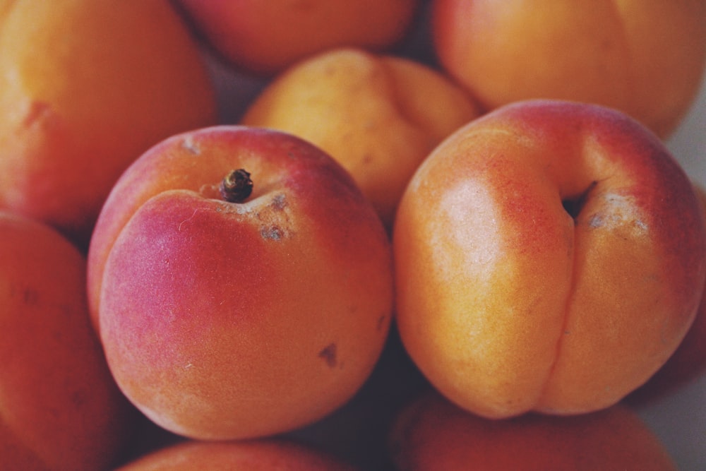 red apple fruit on brown wooden table