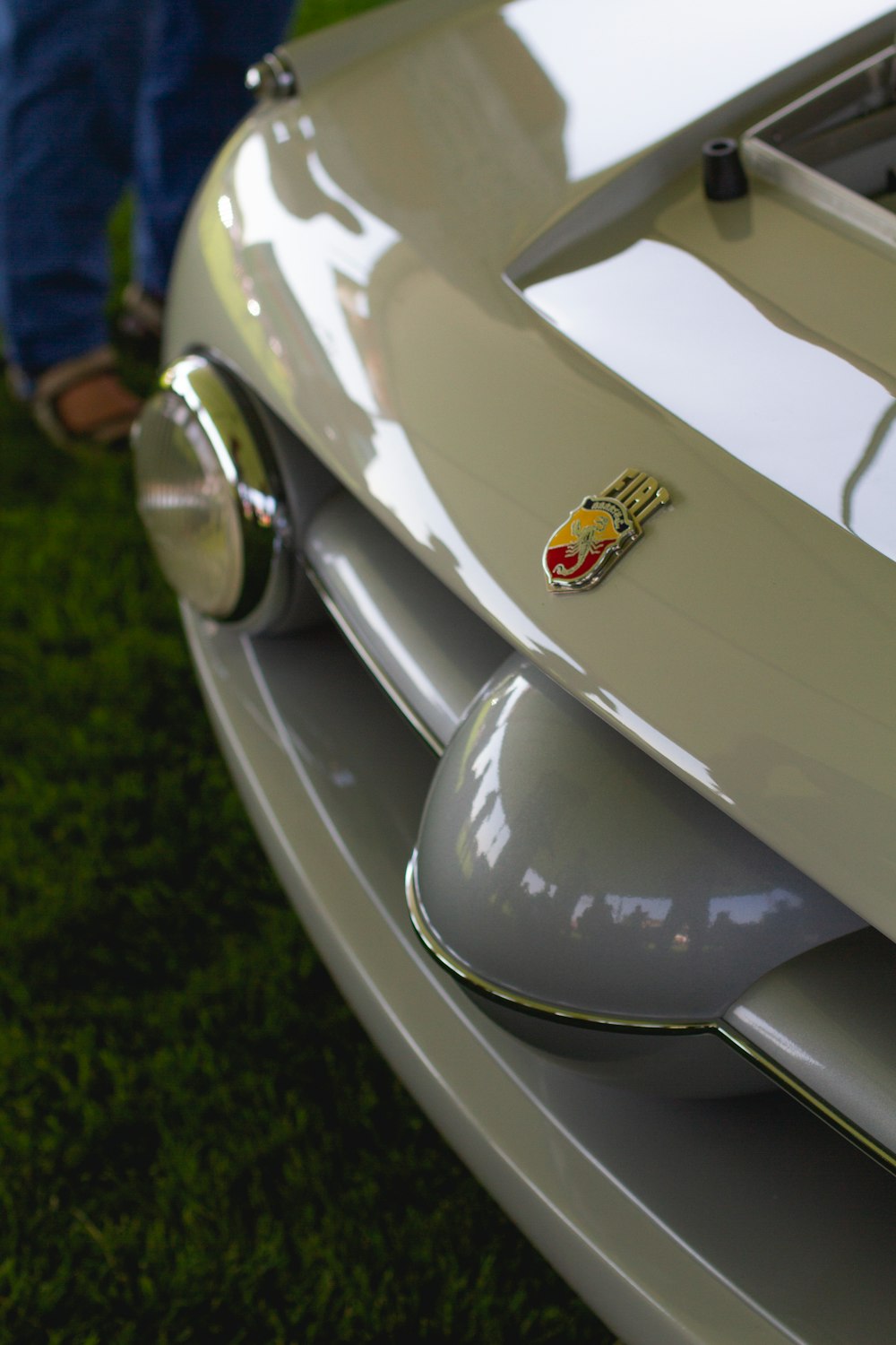 white car with yellow sticker