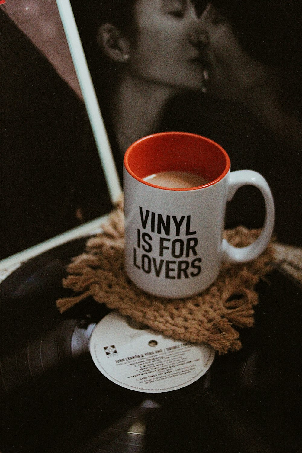 white ceramic mug on brown wooden table