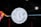 A silver Bitcoin symbol is prominently displayed against a dark background that features a geometric bull shape in vibrant colors on the left side. The background is interspersed with subtle digital patterns and flares of light that suggest a technological or futuristic theme.