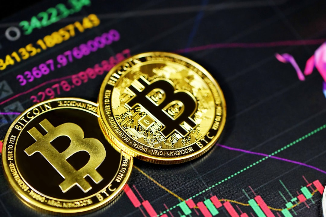Two bitcoin on top of trading chart