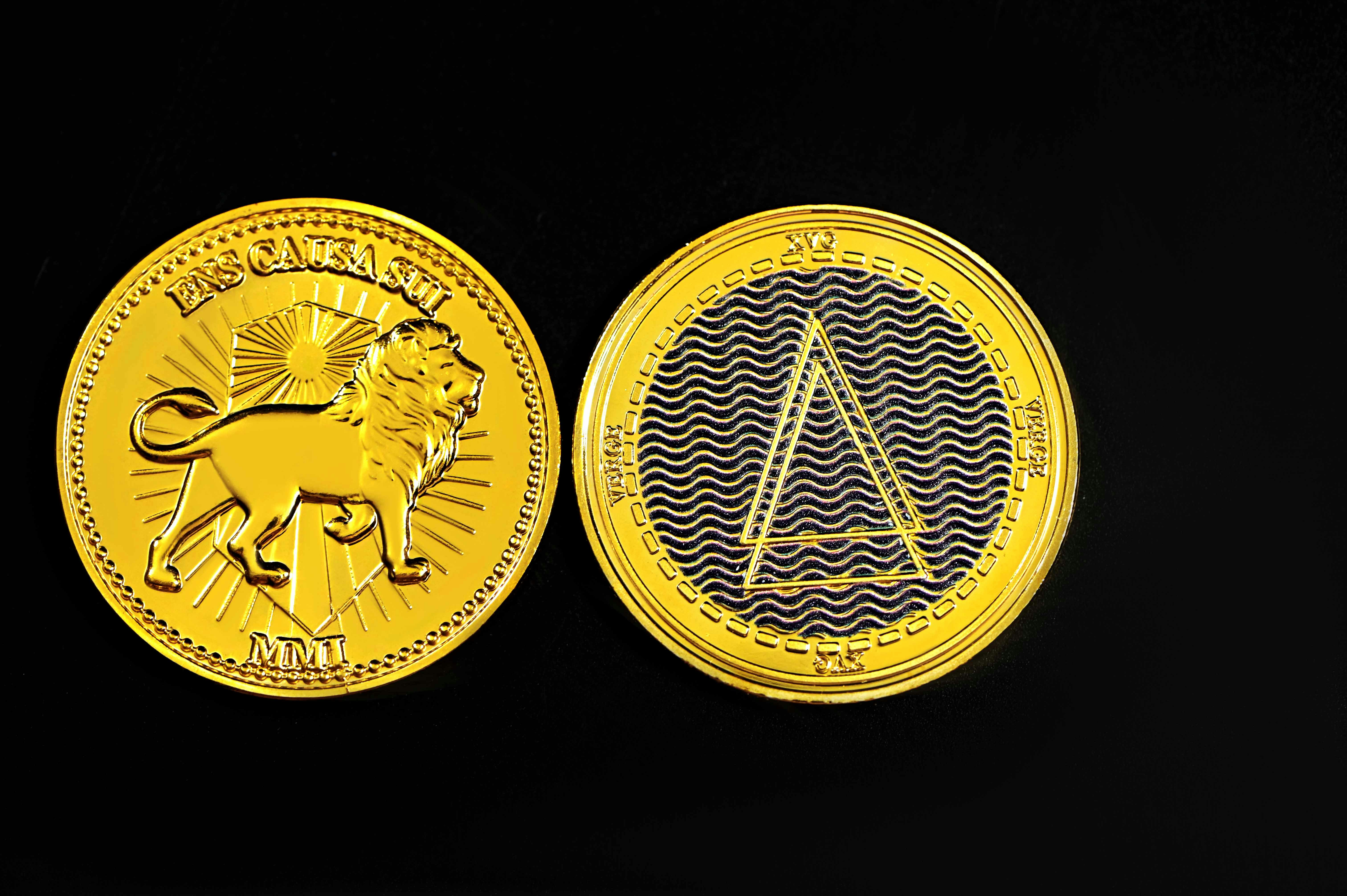 gold and silver round coin