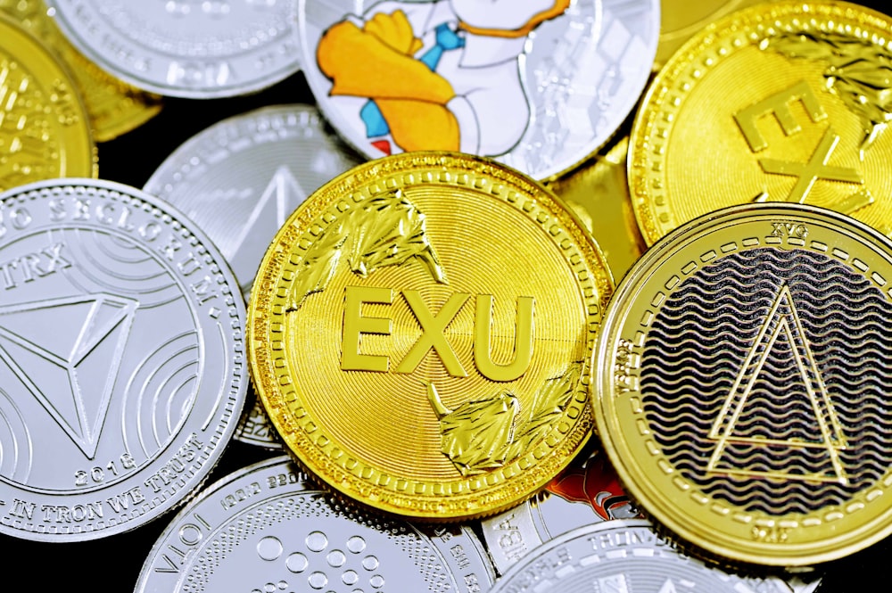 gold round coin on white ceramic plate