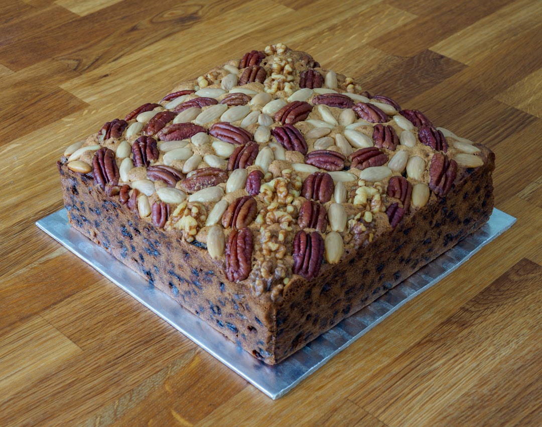 brown and pink cake on brown wooden table