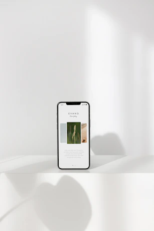 A sleek, minimalistic order tracking interface on a smartphone screen with soft pastel background.