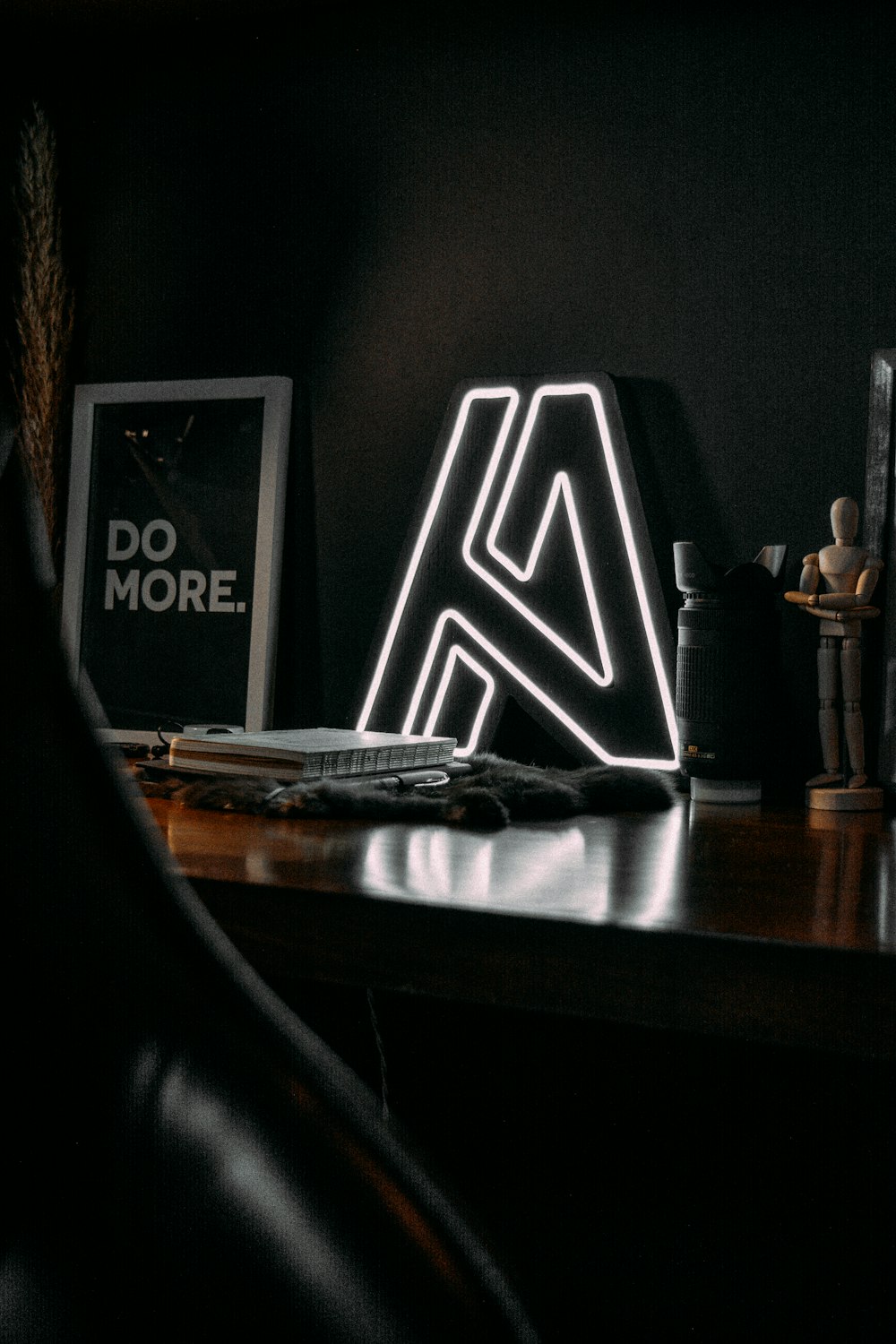 black and white desk lamp on brown wooden table