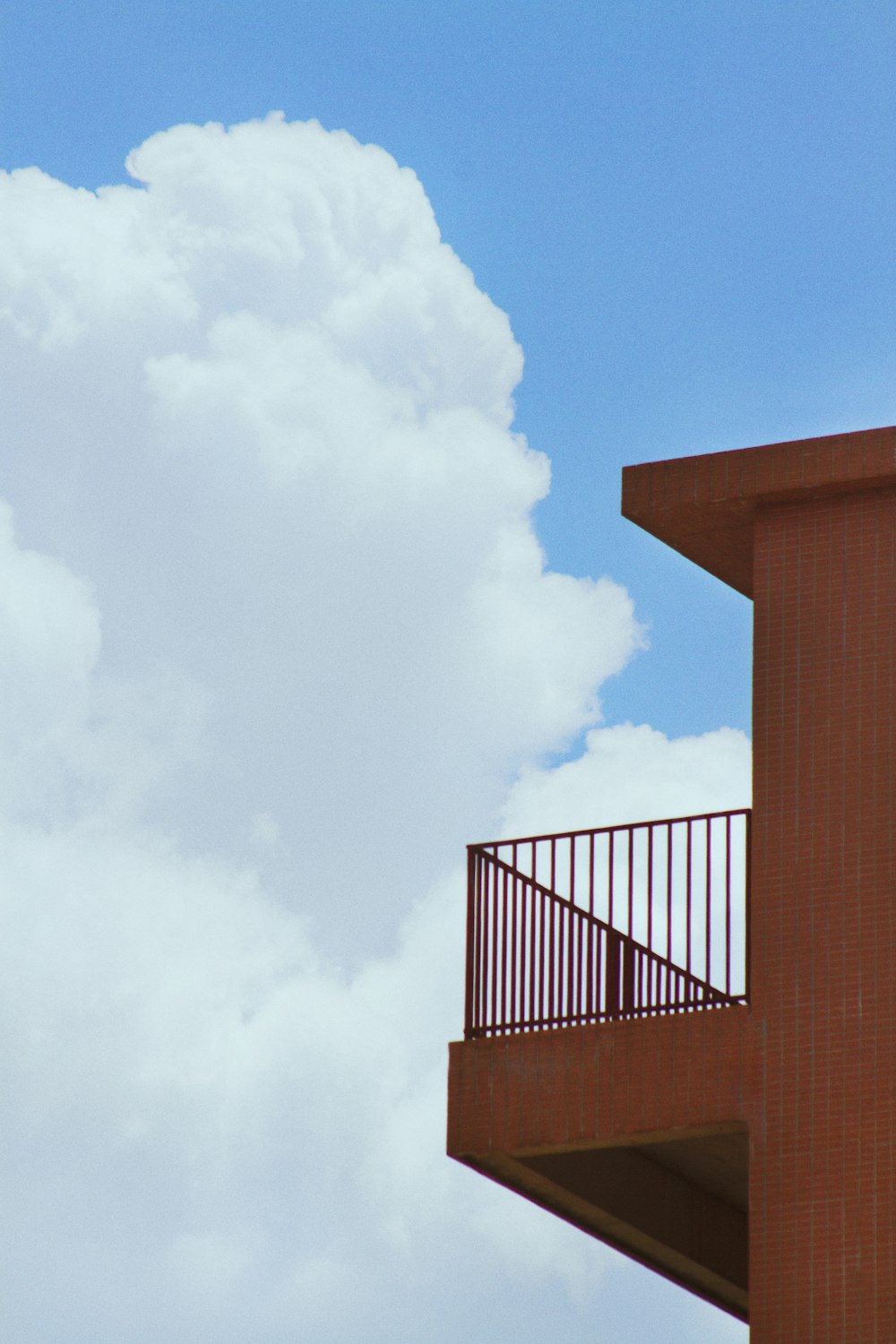 brown concrete building under blue sky during daytime