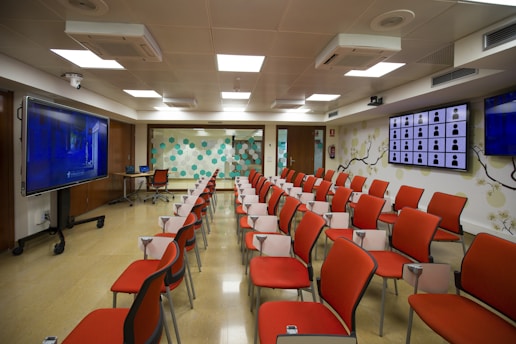red and brown chairs inside room