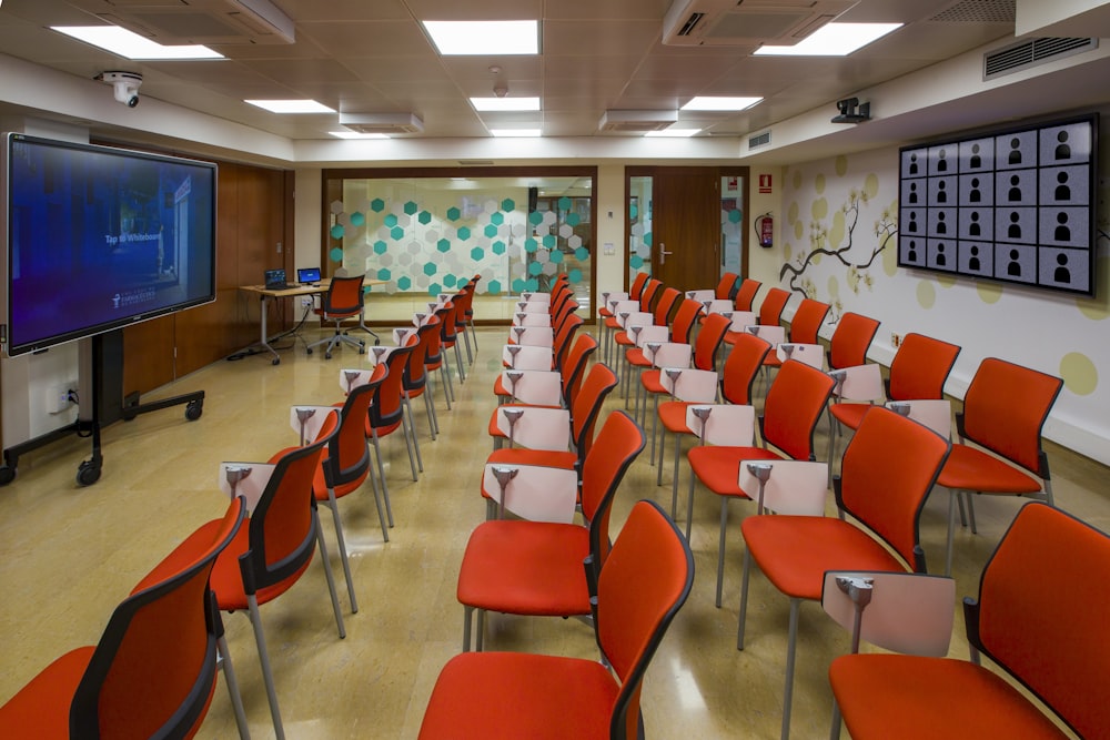 red and white chairs inside room