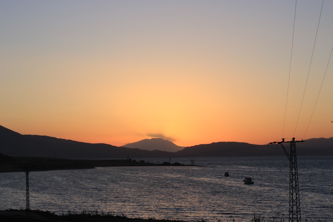 silhouette of mountains during sunset