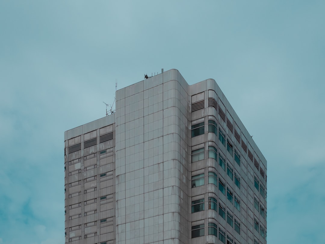 white concrete building under blue sky during daytime