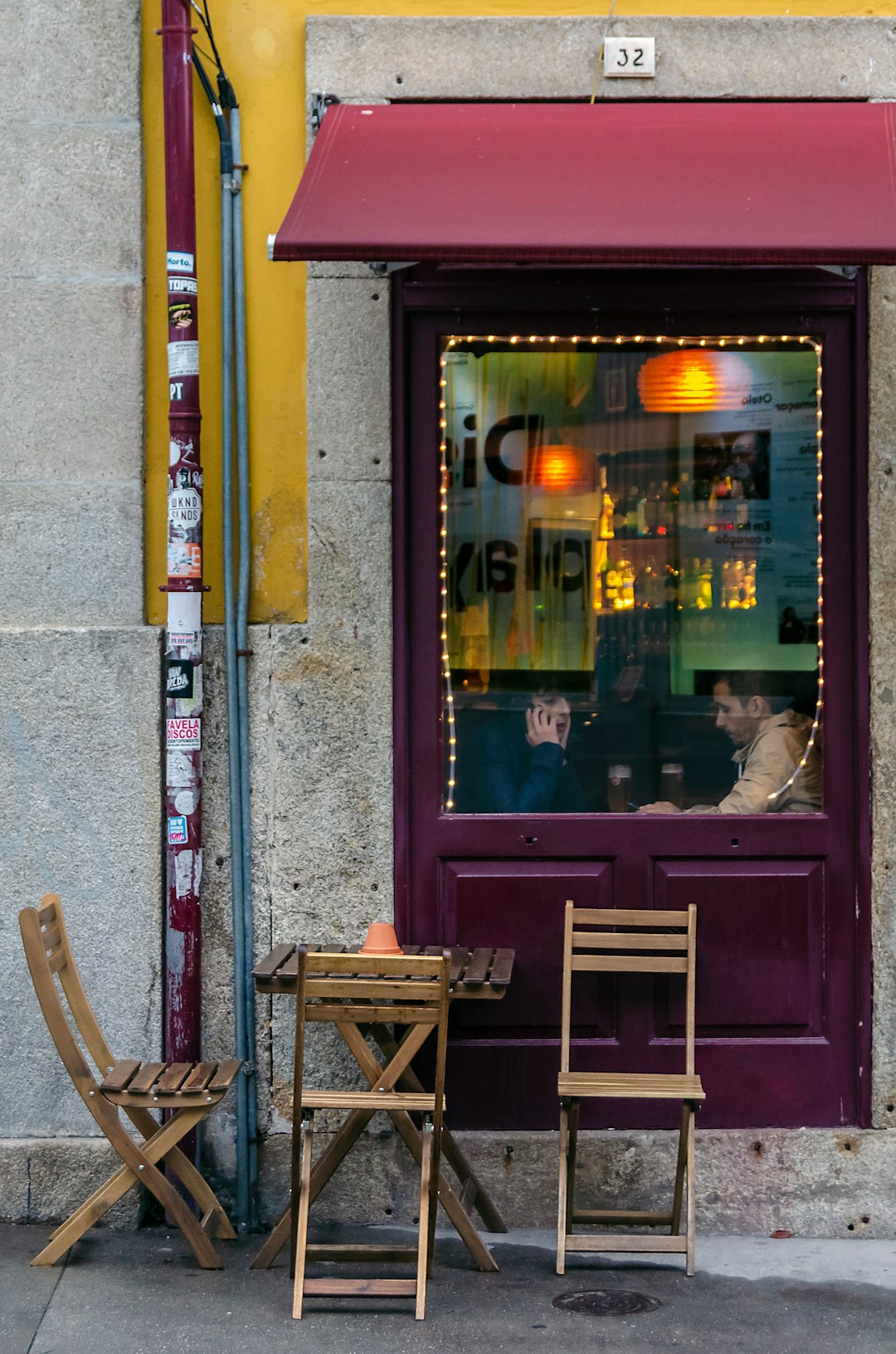 brown wooden chair beside brown wooden door