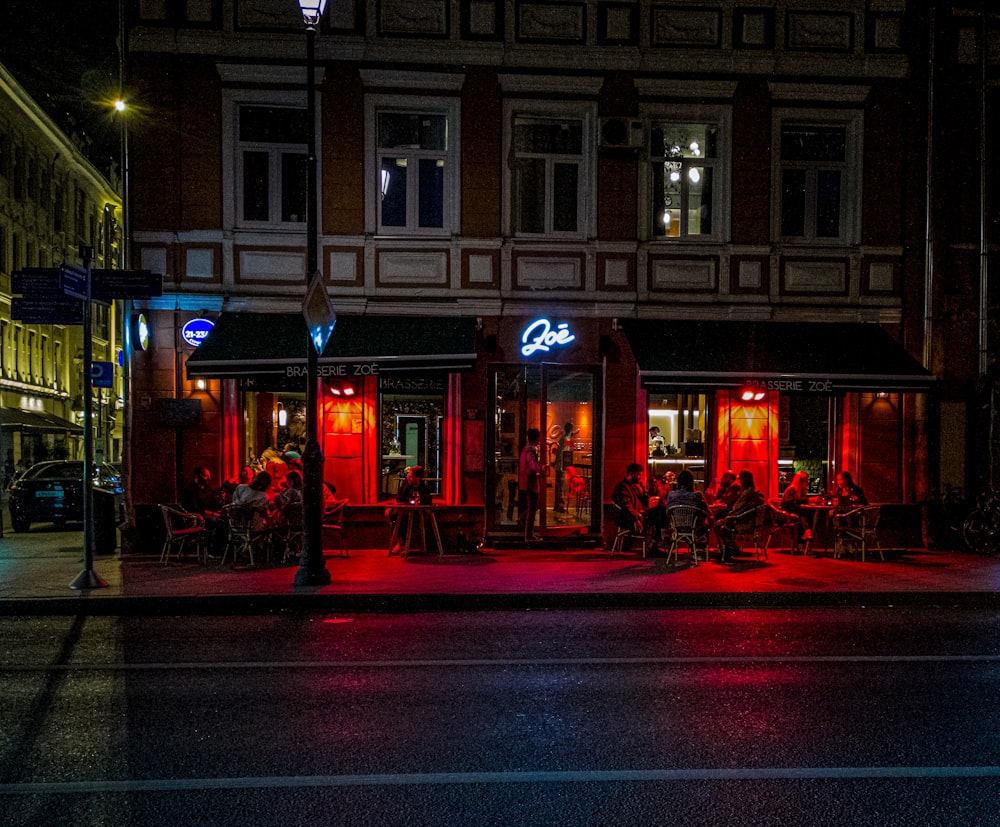 red light on street during night time