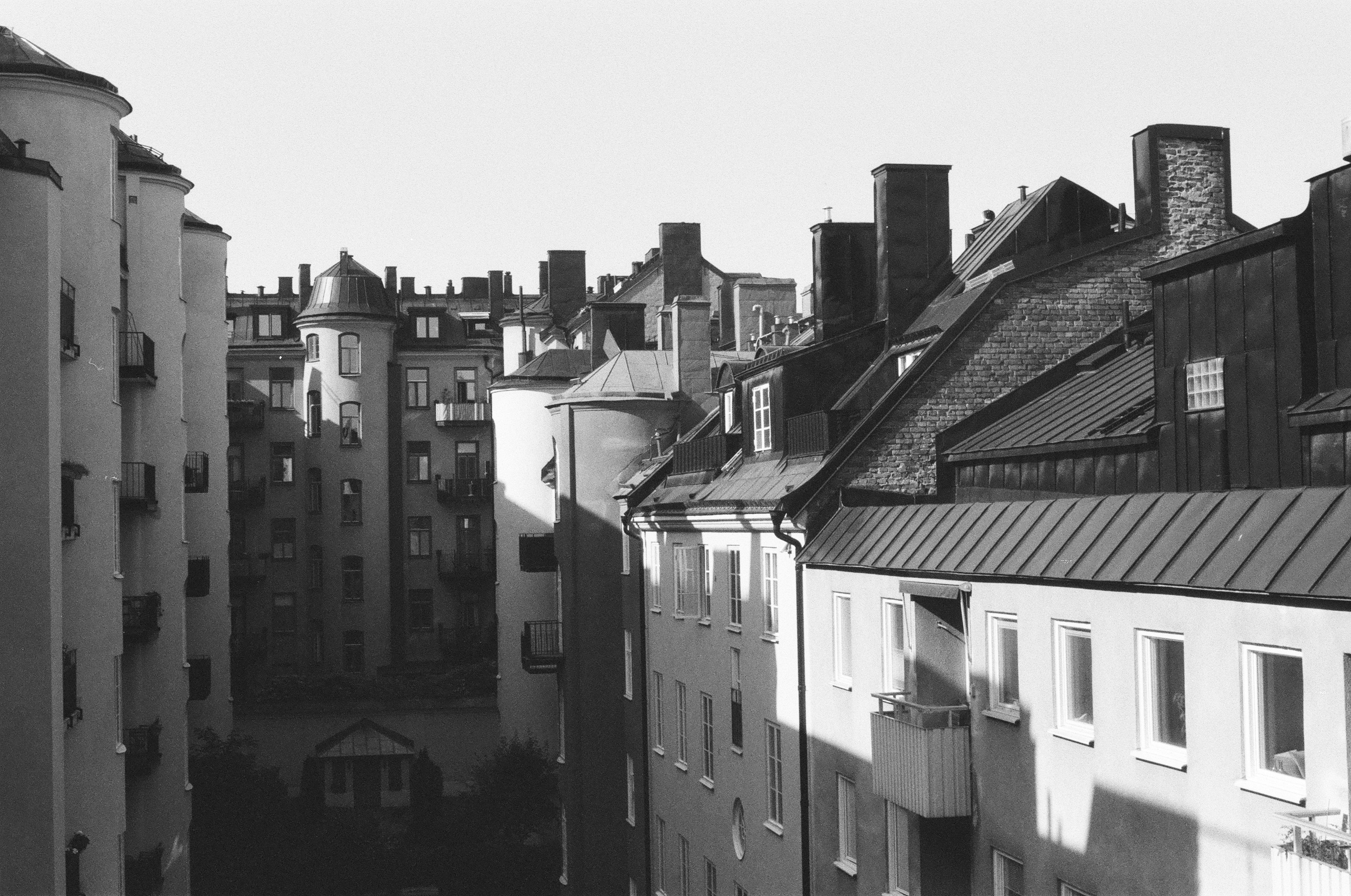 grayscale photo of houses during daytime