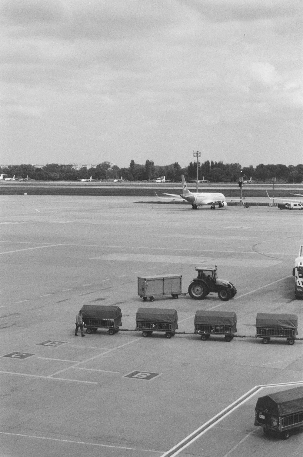 a black and white photo of an airport