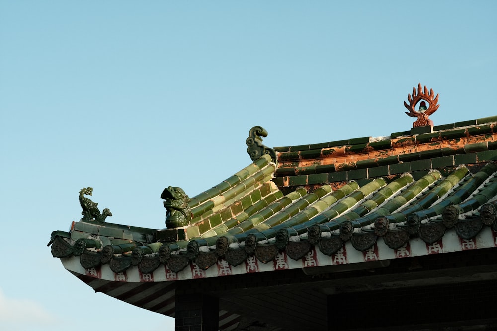 brown and white roof under blue sky during daytime