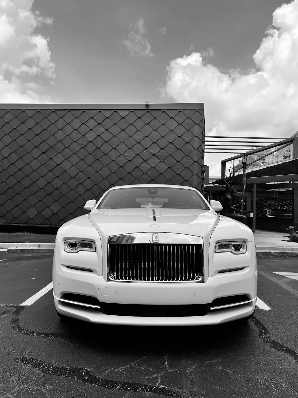 grayscale photo of mercedes benz car on road