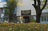 a building with a tree in front of it