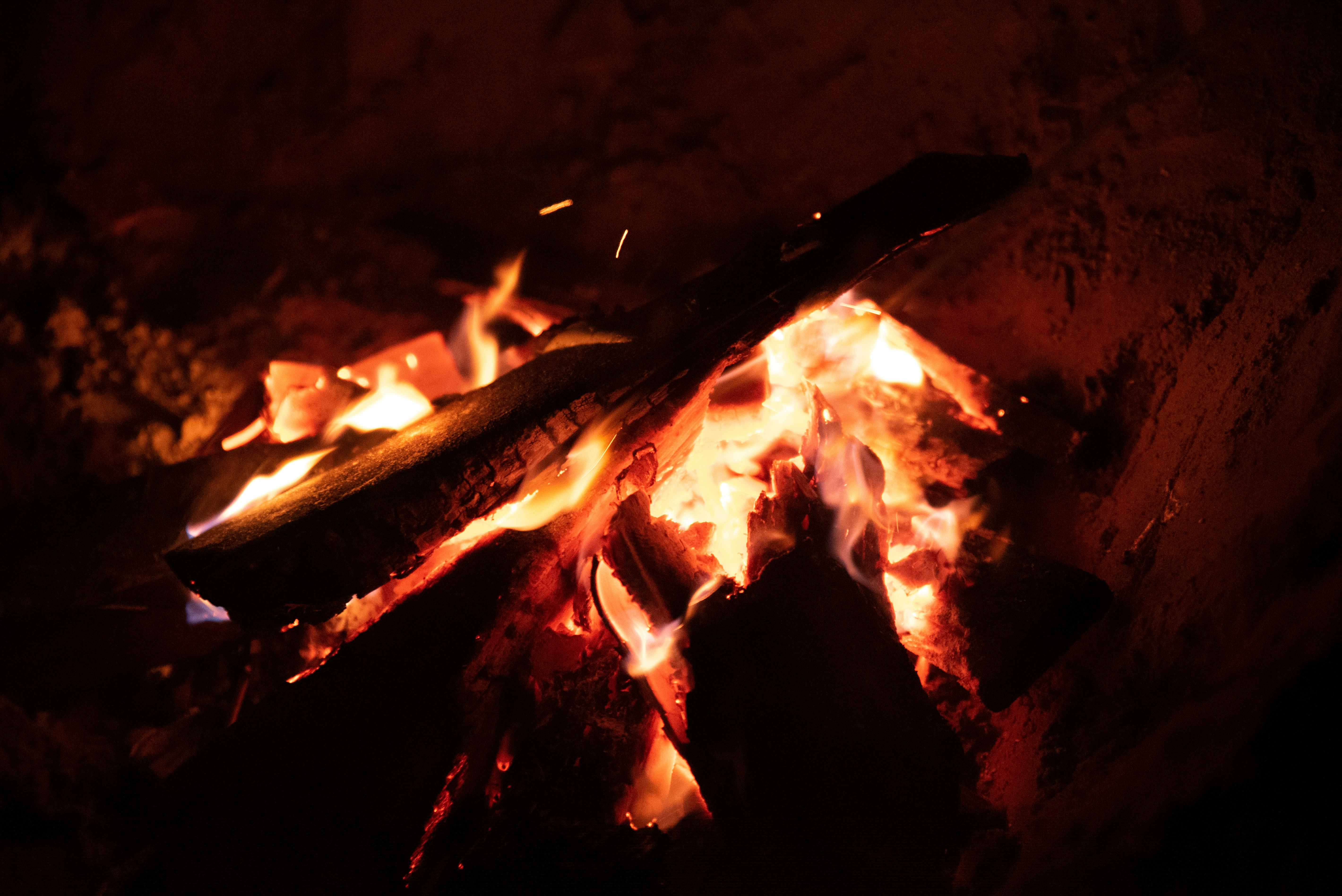 burning wood during night time