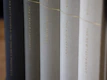 A simple black and white package of books with one book highlighted in soft color grading.