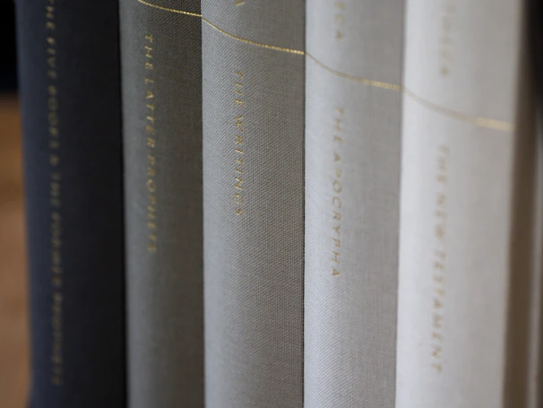 Close-up of a sleek, monochrome legal book spine arranged neatly on a shelf.