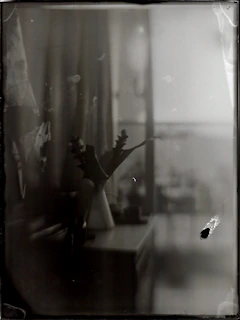 Black and white photo of a 1940s flower shop with Grandpa arranging plants.