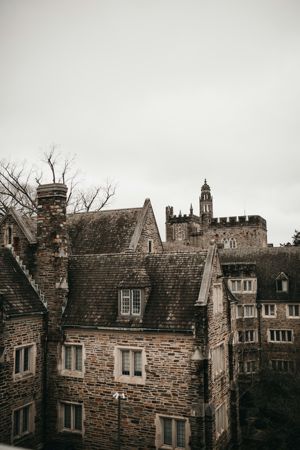 brown brick building under white sky during daytime