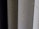 A close-up view of the spines of several hardcover books, with one prominently displaying the title 'THE WRITINGS' in gold lettering.