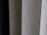A close-up view of the spines of several hardcover books, with one prominently displaying the title 'THE WRITINGS' in gold lettering.
