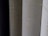 A close-up view of the spines of several hardcover books, with one prominently displaying the title 'THE WRITINGS' in gold lettering.