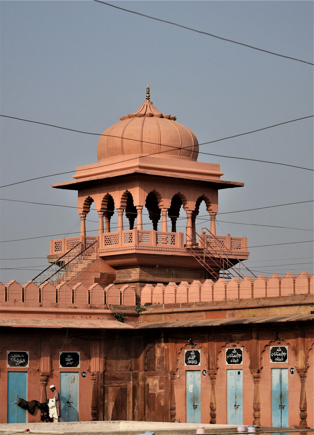 brown concrete building under blue sky during daytime