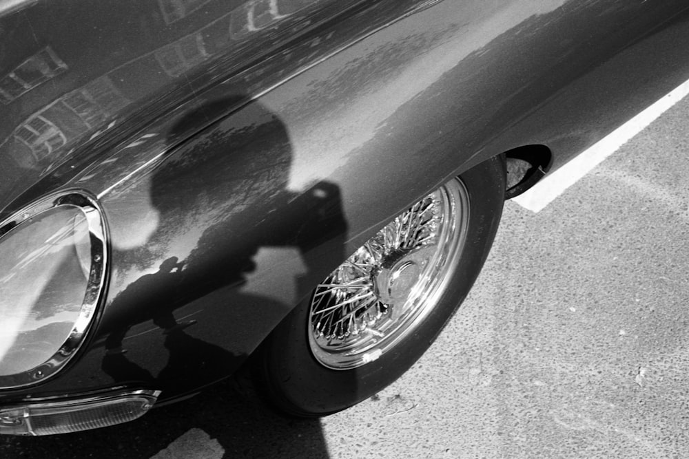 grayscale photo of car on road