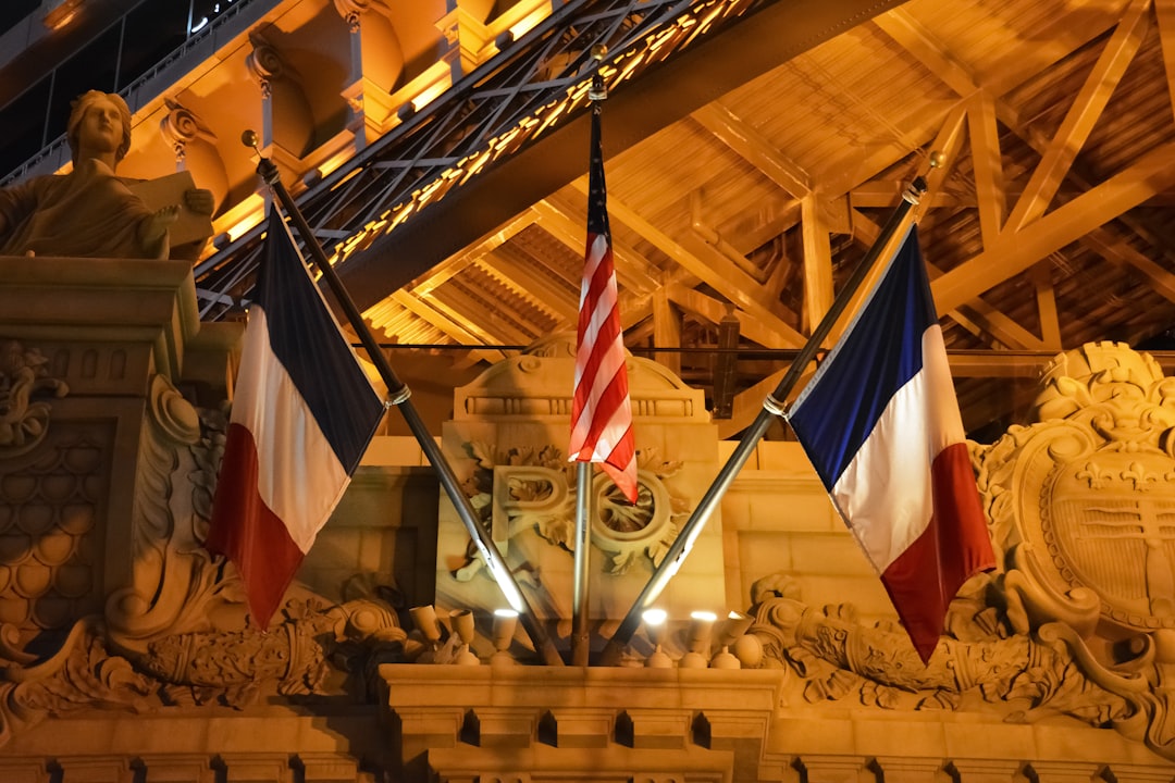 flags on brown wooden pole